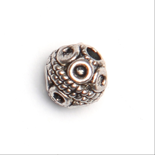 4 PERLES METAL ORNEES
