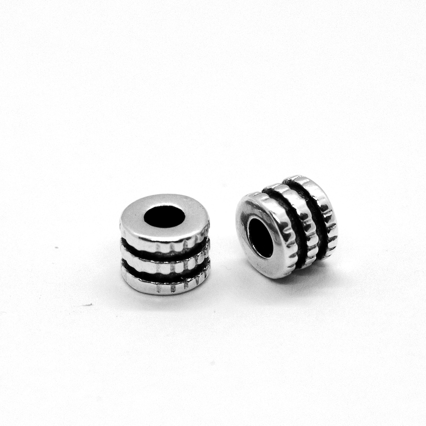 4 PERLES METAL 